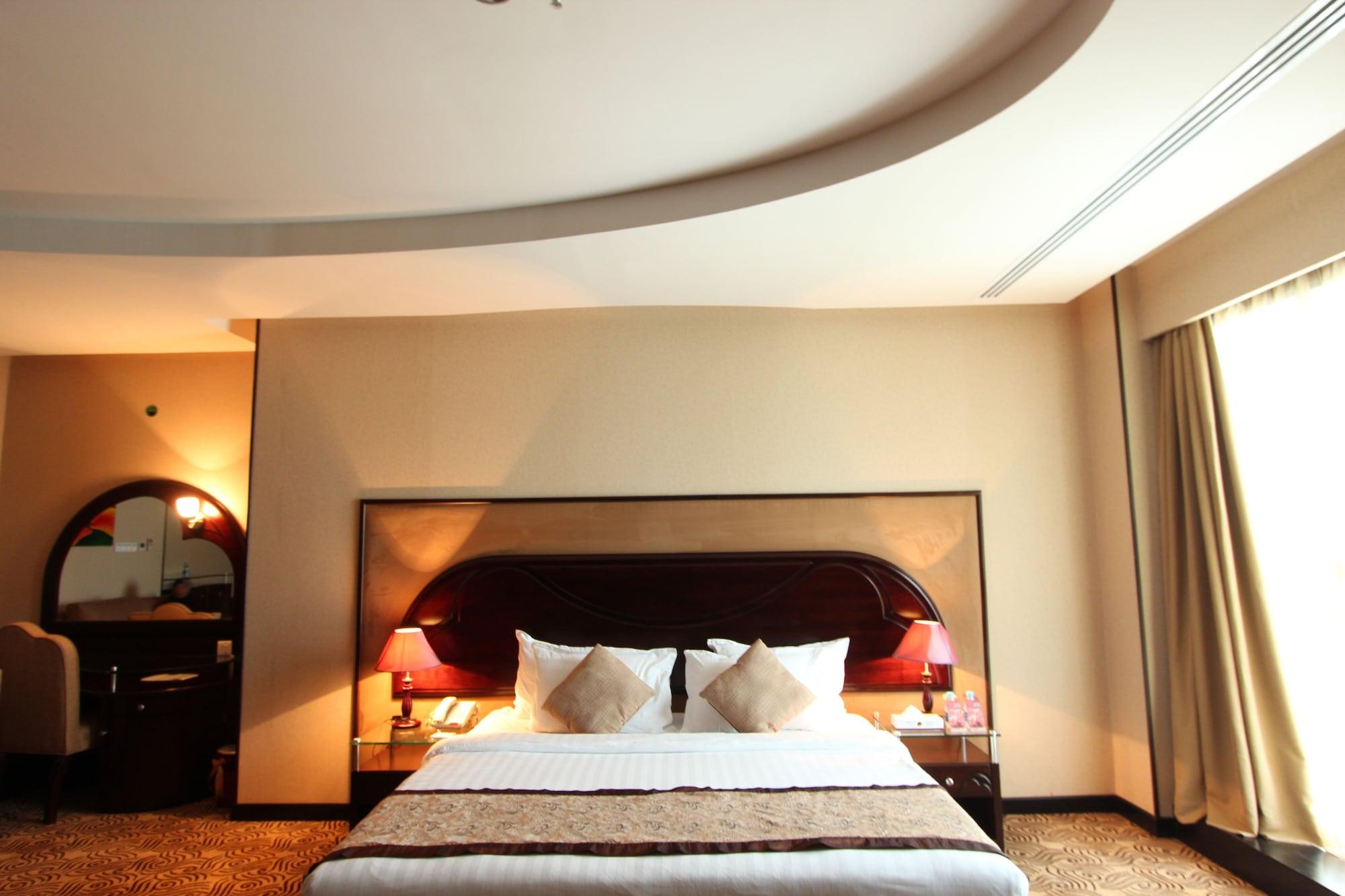 Awaliv International Hotel Ta'if Buitenkant foto A bedroom at the hotel