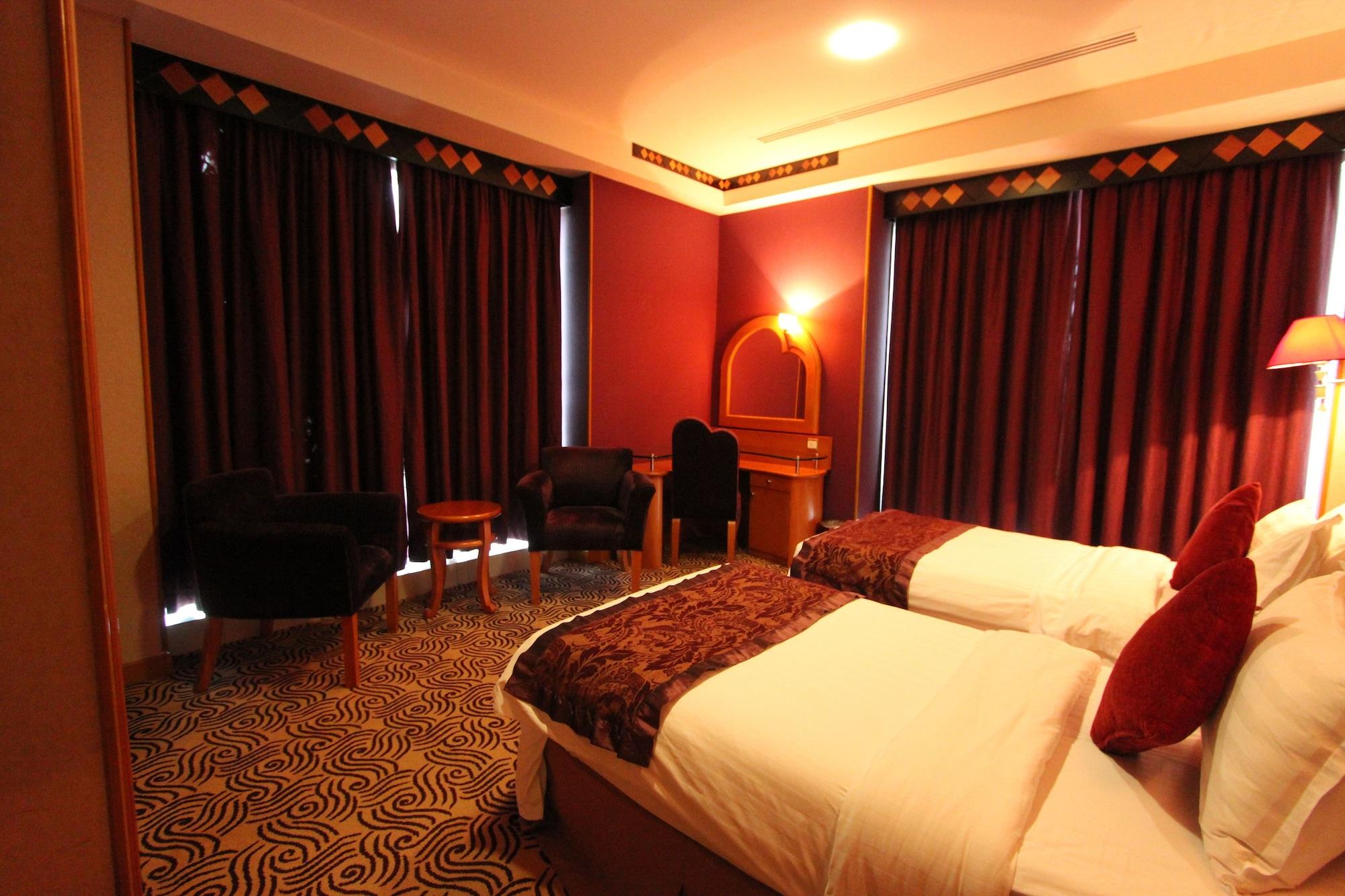 Awaliv International Hotel Ta'if Buitenkant foto A room at the hotel