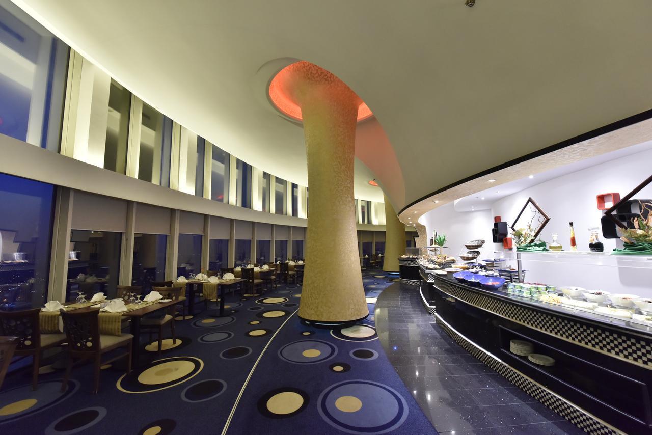 Awaliv International Hotel Ta'if Buitenkant foto The restaurant