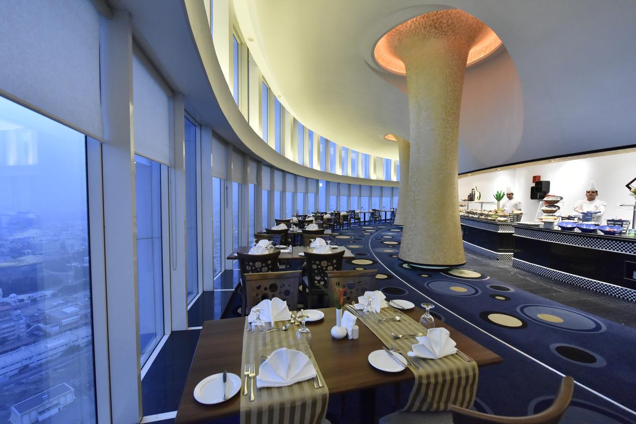 Awaliv International Hotel Ta'if Buitenkant foto The restaurant