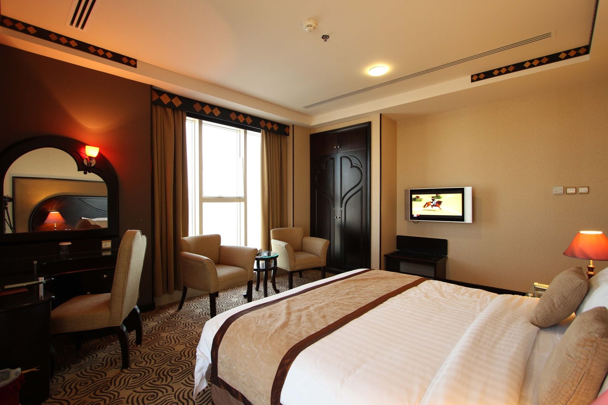 Awaliv International Hotel Ta'if Buitenkant foto A room at the hotel